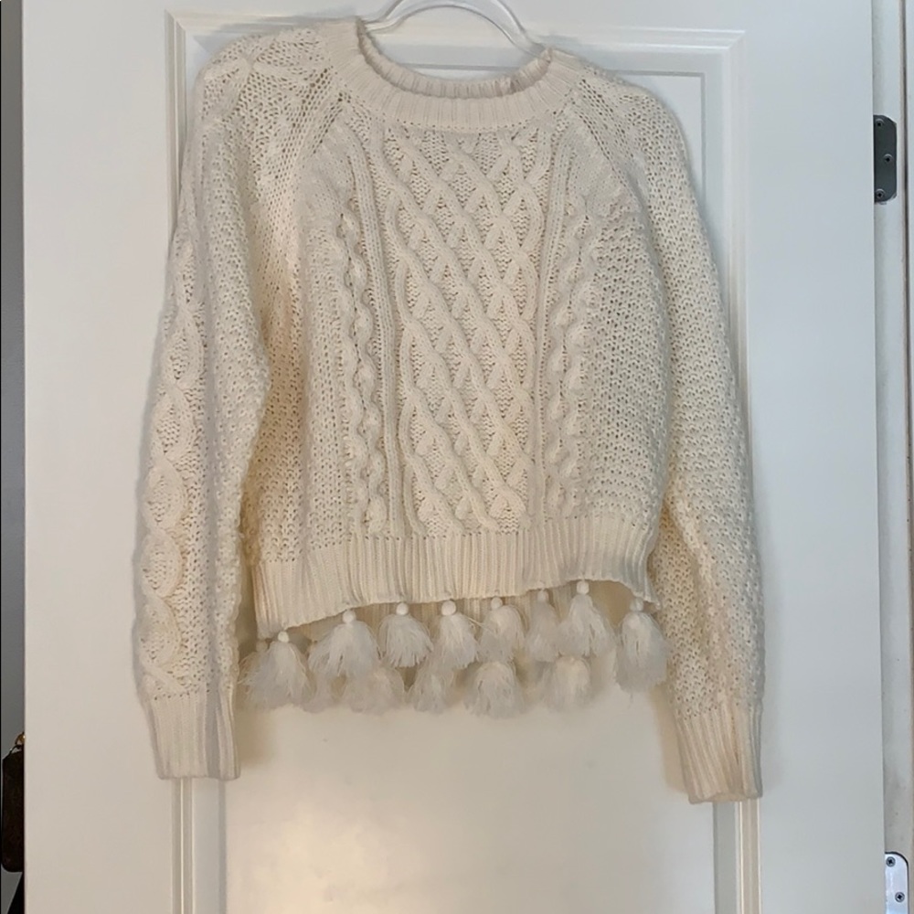 Hem & Thread cream sweater with tassels.